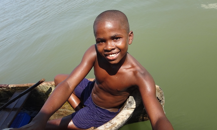 Young man in a boat