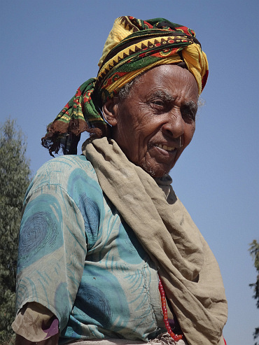 Old lady on the roadside