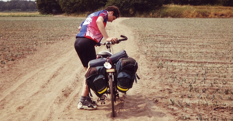 The author is pushing the bike in the Drunense Duinen, Netherlands