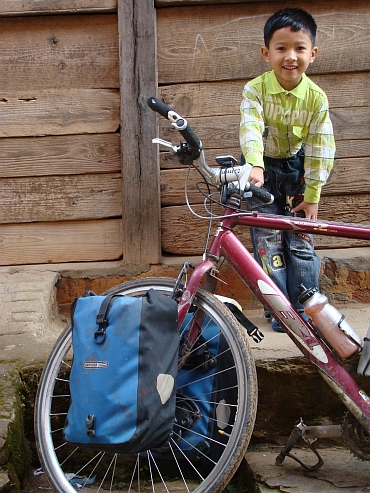 Boy posing with my bicycle, Tansen