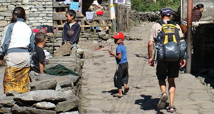 Willem is passing through a village