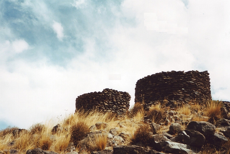 The death tombs of Sillustani rise solemnly out of the earth